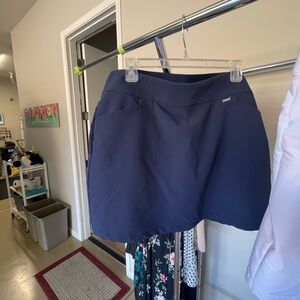 Sporty Women's Blue and White Skorts, bundled.
